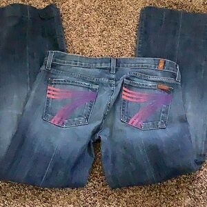 Women's Blue Denim Jeans with Purple-Pink Pocket Design